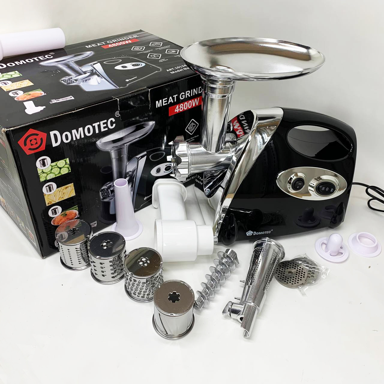 М'ясорубка електрична DOMOTEC MS-2025 3 в 1 4800 Вт із соковижималкою, терками, шатківниками та реверсом - Зображення 4