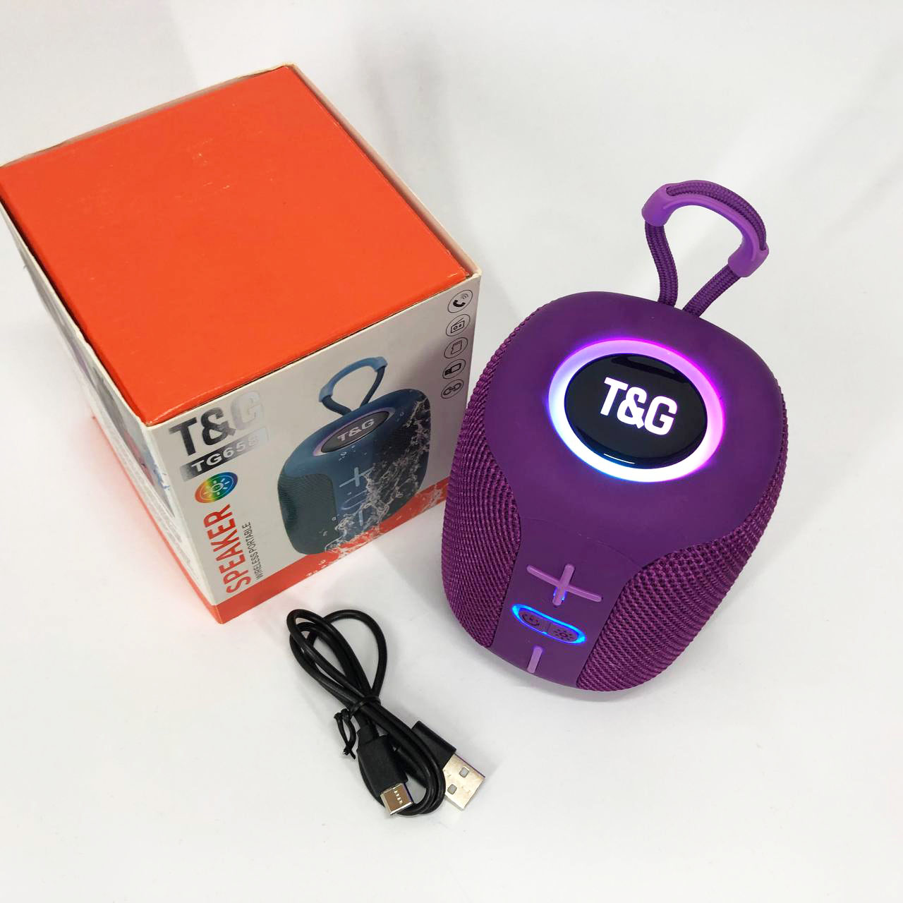 Портативна Bluetooth колонка TG658 8W з RGB підсвічуванням бездротова портативна потужна. Колір: фіолетовий 6 Портативна Bluetooth колонка TG658 8W з RGB підсвічуванням бездротова портативна потужна. Колір: фіолетовий - Зображення 6